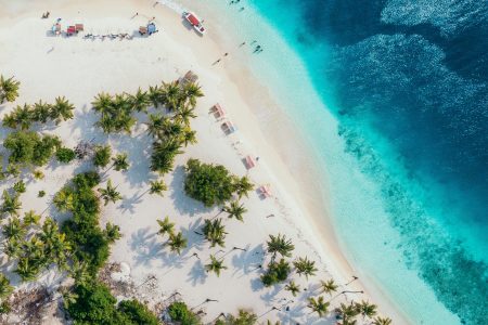 Wat kun je combineren met een strandlaken als cadeau?
